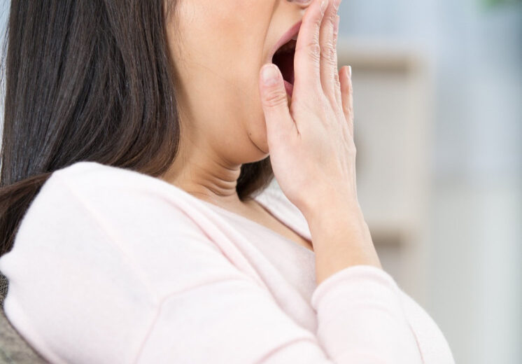 A women yawning